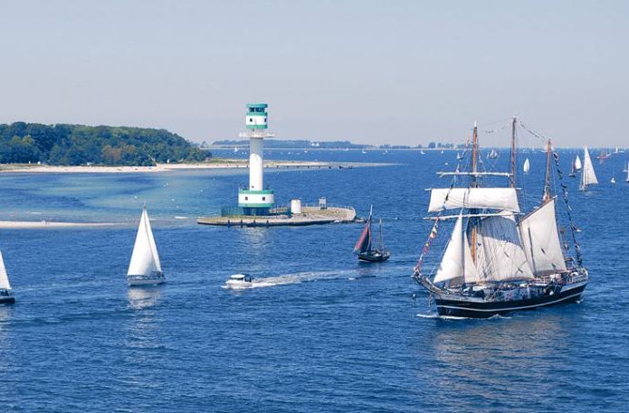 Picture of sailboats and light house