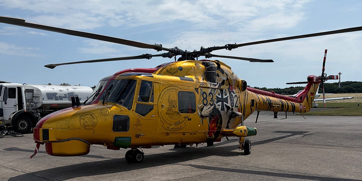 Side view of yellow helicopter