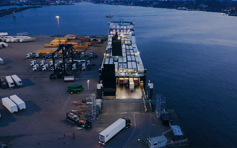 Aerial view of cargo ship being loaded