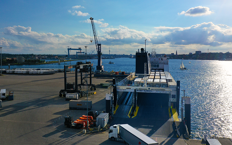 Aerial view of cargo ship unloading