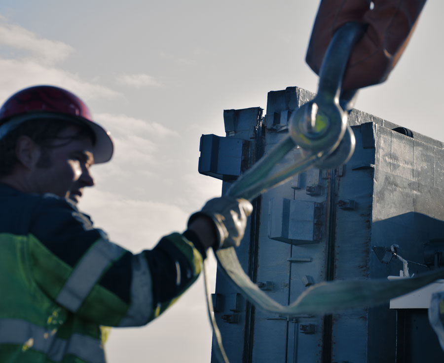 Heavy goods loading close-up employee