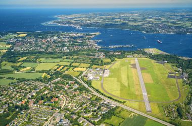 Aerial view of Kiel Airport with the Kiel Fjord and the Baltic Sea