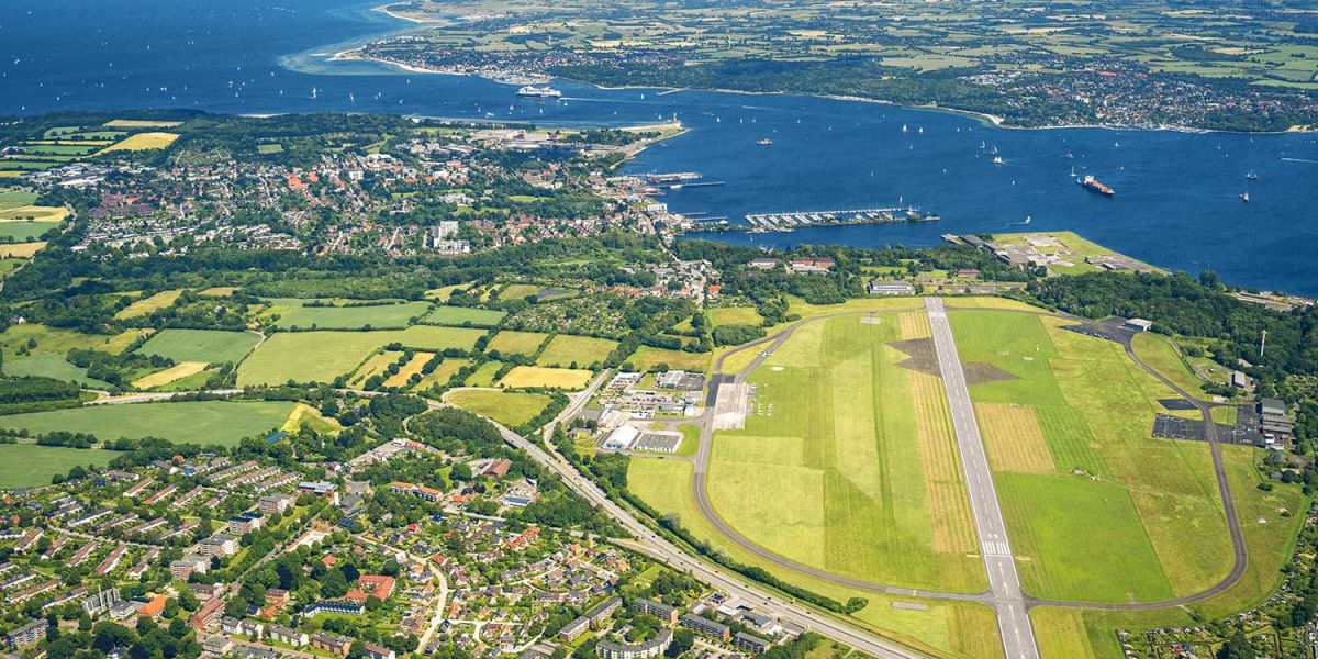 Aerial view of Kiel Airport with the Kiel Fjord and the Baltic Sea